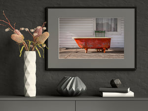 Artistic shot of a retro bathtub on Route 66, capturing the essence of vintage travel and nostalgia.