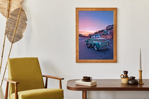 Classic Chevrolet truck in the foreground of a colorful Utah evening landscape