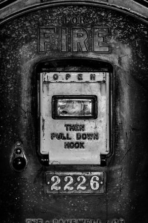 Industrial wall art of weathered fire alarm box