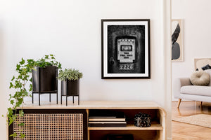 Textured metal surface fire alarm number plate