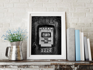 Eccentric wall art featuring old fire alarm signage