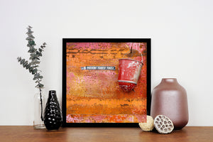 Orange and pink flaking paint surrounding a vintage fire bucket.