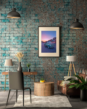 Weathered vehicle surrounded by red rock terrain