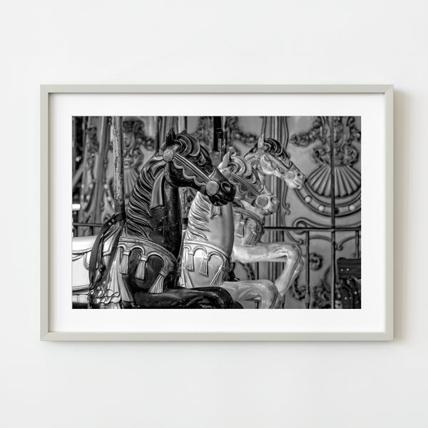 Vintage merry-go-round horses black and white photo