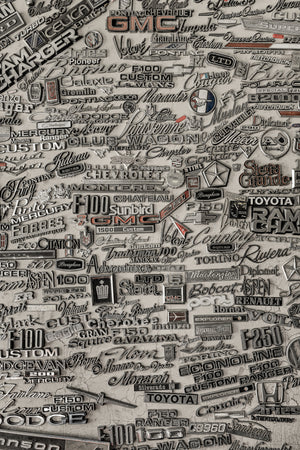 Monochrome collection of classic automotive badges