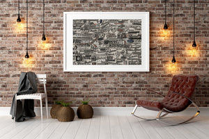 Wall covered with antique car nameplates
