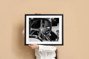 Close up of Cadillac steering wheel and dashboard gauges