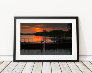Warm sunset light over a wooded stretch of the Intracoastal Waterway.