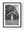 Wabash Township 1874 schoolhouse beneath a leafy tree in black and white.