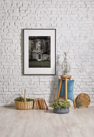 White door and upper window in an old English country home