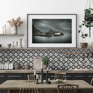 Dark overcast sky above a small Lofoten waterfront building