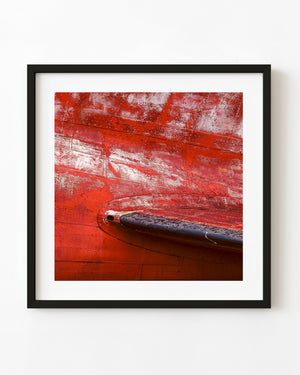 Weathered red aircraft wing detail photographed in Alaska