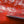 Close-up of red aircraft panels, rivets and worn paint in Alaska