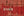 Close-up of red wooden rail car boards marked 1018