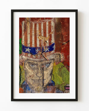 Weathered Uncle Sam mural on a textured red urban wall