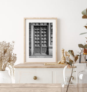 Historic Uruguay doorway with peeling timber, window grids and textured brickwork