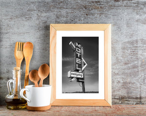 abandoned motel sign western canada black and white