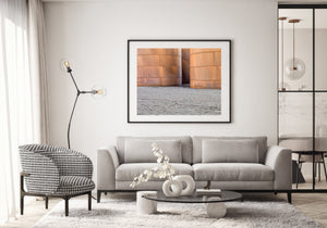 Orange brown industrial tank surfaces with riveted seams
