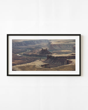 Winding river among layered mesas in Canyonlands Utah