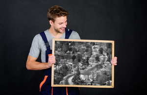 Winter aerial view of small town street and homes