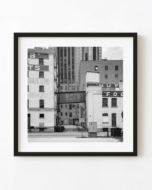 Winnipeg warehouse alley and enclosed skywalk in black and white