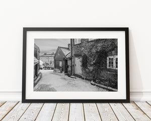 Textured wall and old doorway in snowy Oslo