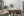 Rural Romanian landscape with rustic sheds and crossing fence lines