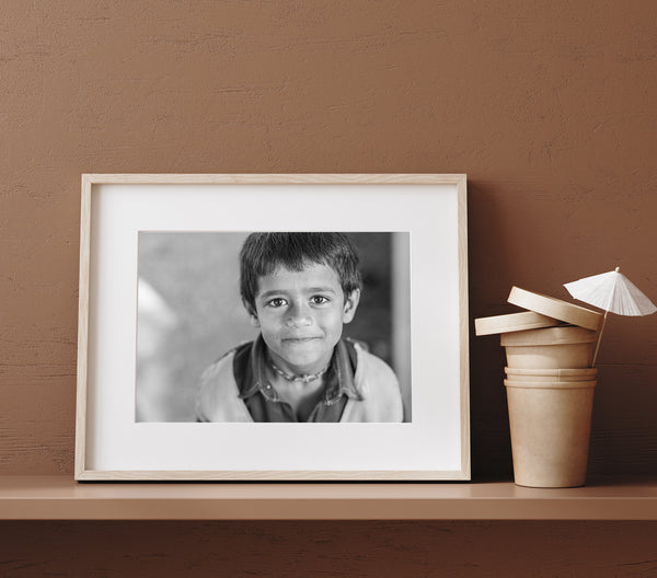 Black and white portrait of child in Odanadi