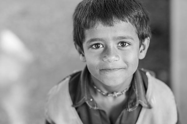 Monochrome portrait of boy at school