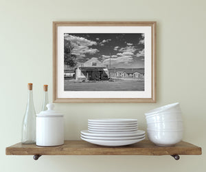 Black and white rural architecture in Currie with weathered siding and wide sky