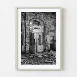 Black and white photograph of an abandoned hotel entrance near Zagreb Croatia