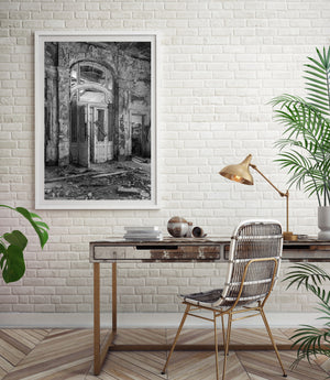 Ruined Croatian interior with decorative arch graffiti and debris