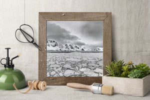 Fractured sea ice across an Antarctic mountain landscape