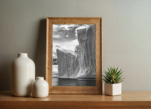 Vertical Antarctic iceberg with deep grooves and textured ice