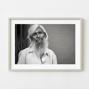 Bearded elderly man portrait in India black and white