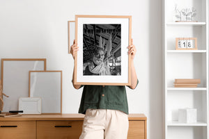 Environmental portrait of a bearded Indian man inside a workshop