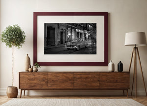 Night street photography of an old taxi in Havana Cuba