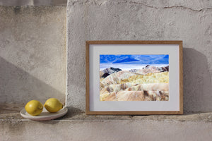 Layered cream pink and yellow hills in Death Valley