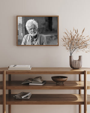 Horizontal black and white portrait of an elderly man in India