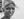 Close portrait of an elderly woman with silver hair and direct gaze