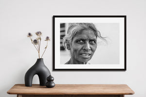Close-up portrait showing an elderly woman's eyes and facial texture