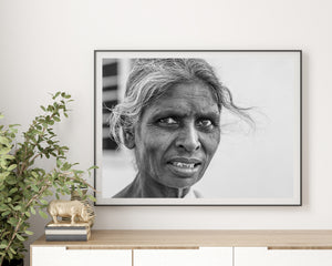 Black and white Indian street portrait with detailed face and silver hair