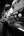 Black and white Times Square street scene with solitary woman