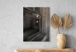 Old interior window opening with rough plaster and worn wood
