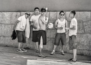 Black and white street portrait of five men at Wasaga Beach