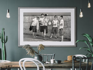 Five men with sunglasses towel ball and drinks against a wall