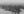 Foggy Newfoundland lake with conifer covered island