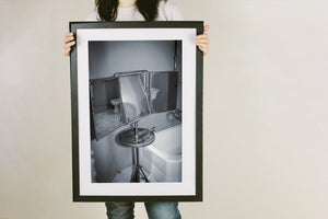 Hinged three panel mirror in historic Spanish washroom