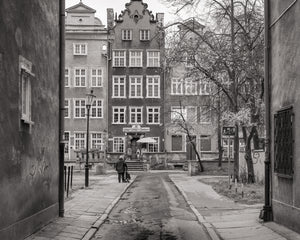 Narrow street in central Gdansk with historic city buildings