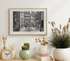 Urban Gdansk street with weathered walls and bare trees